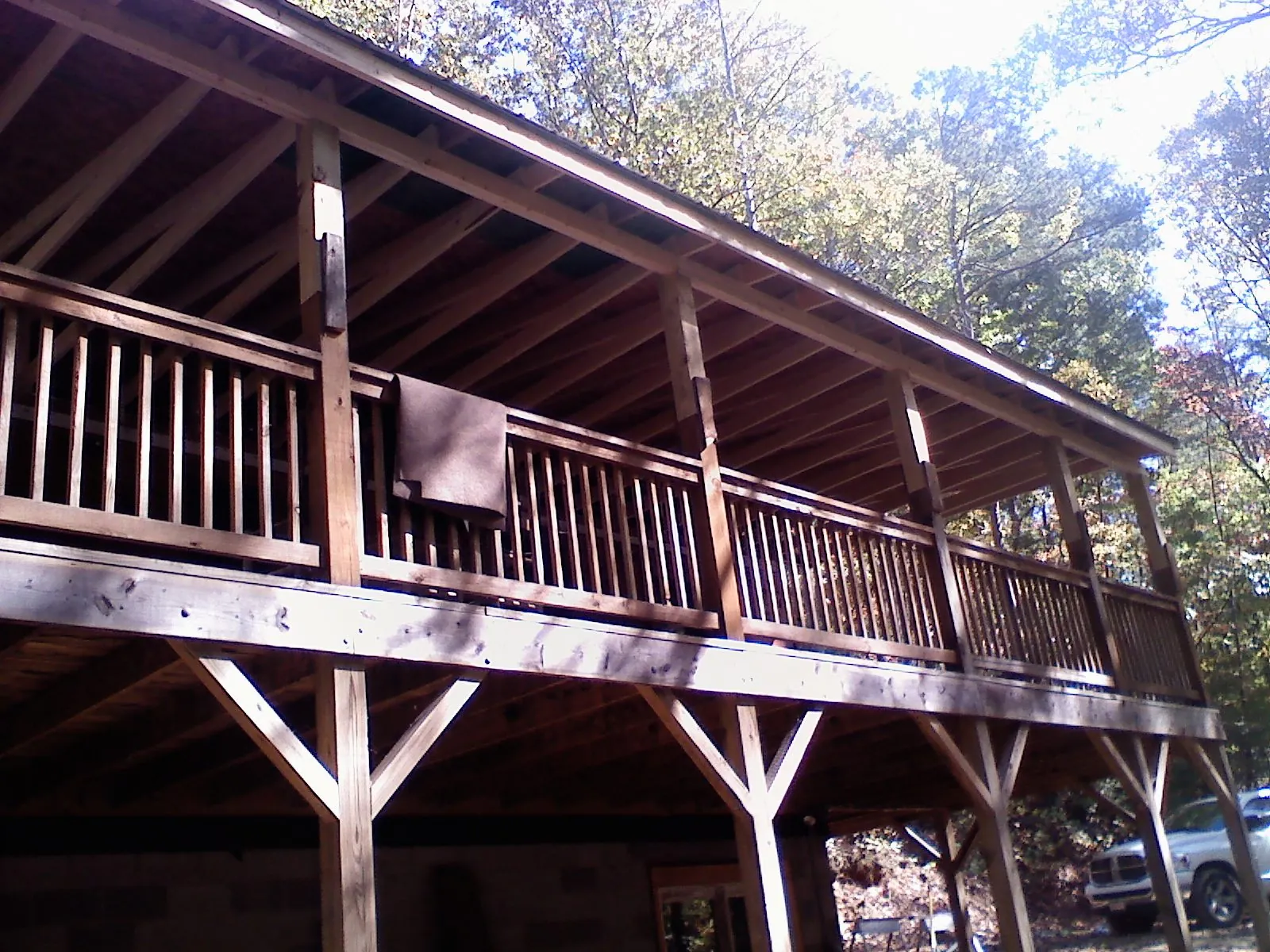 Timber framing under a new elevated porch and deck — Roof Leak Repair in Paeonian Springs by Roofing Brothers